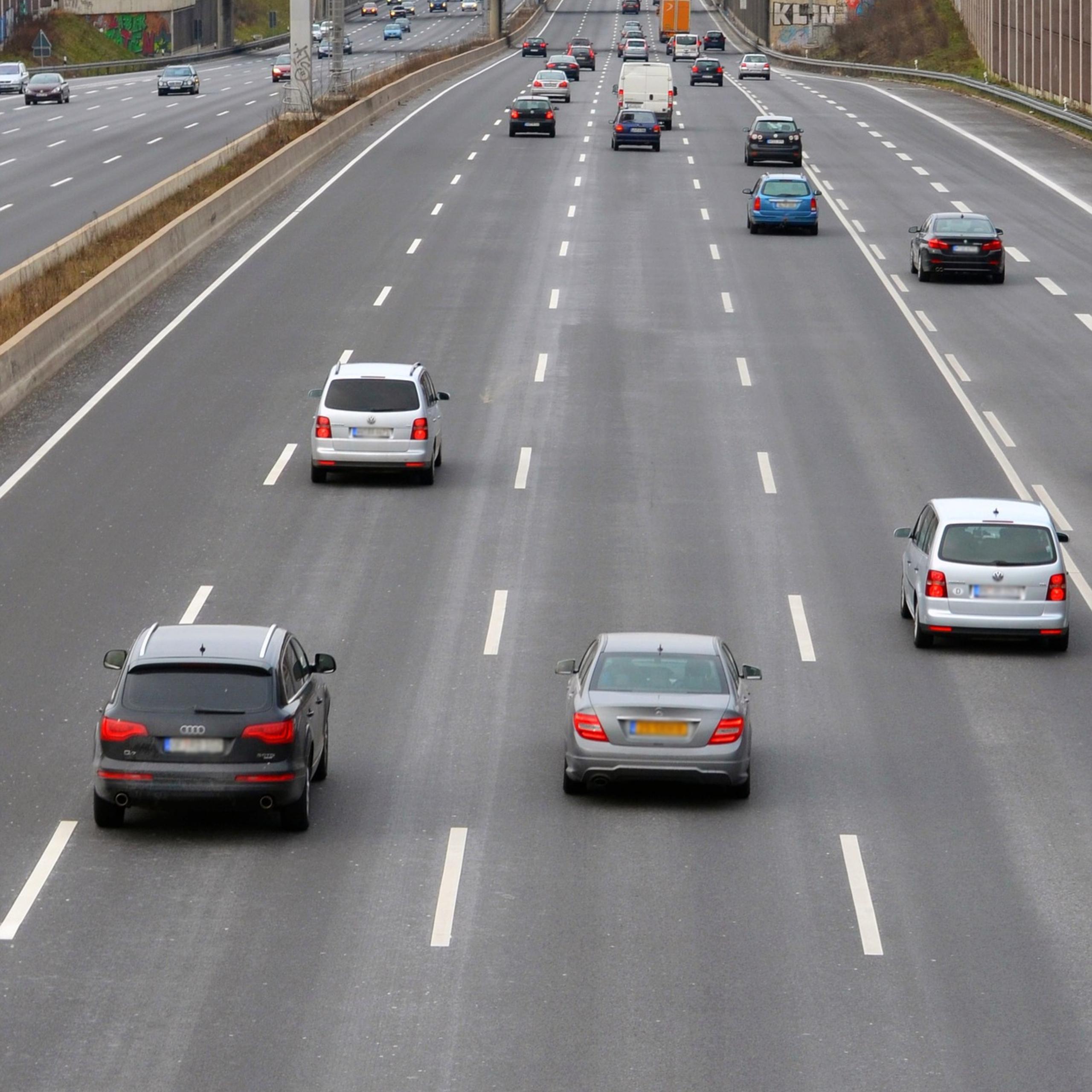 cars driving on multi-lane highway