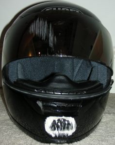 motorcycle helmet with damage after accident