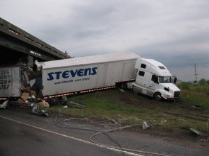 semi truck on side of road after crash