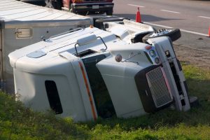tractor trailer truck rolled over after auto accident