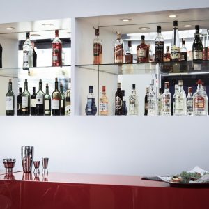 shelves of alcohol and liquor bottles at bar