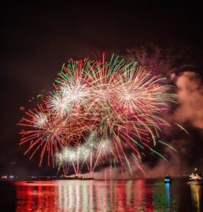 fireworks over river