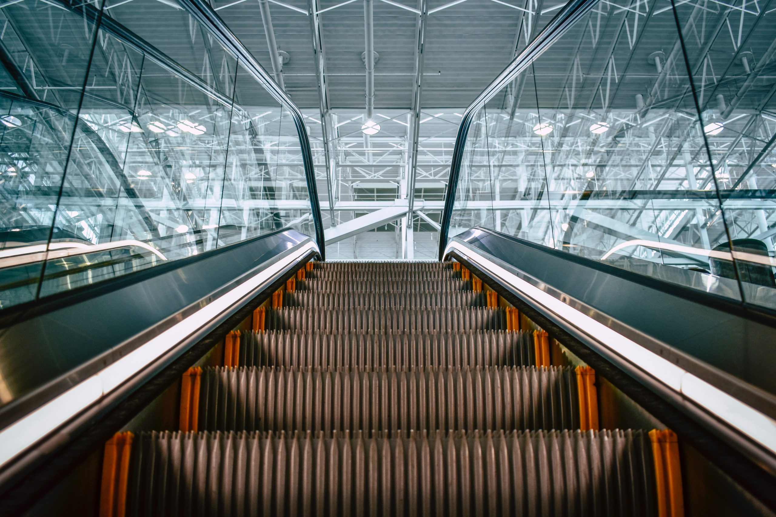 escalator with glass panels