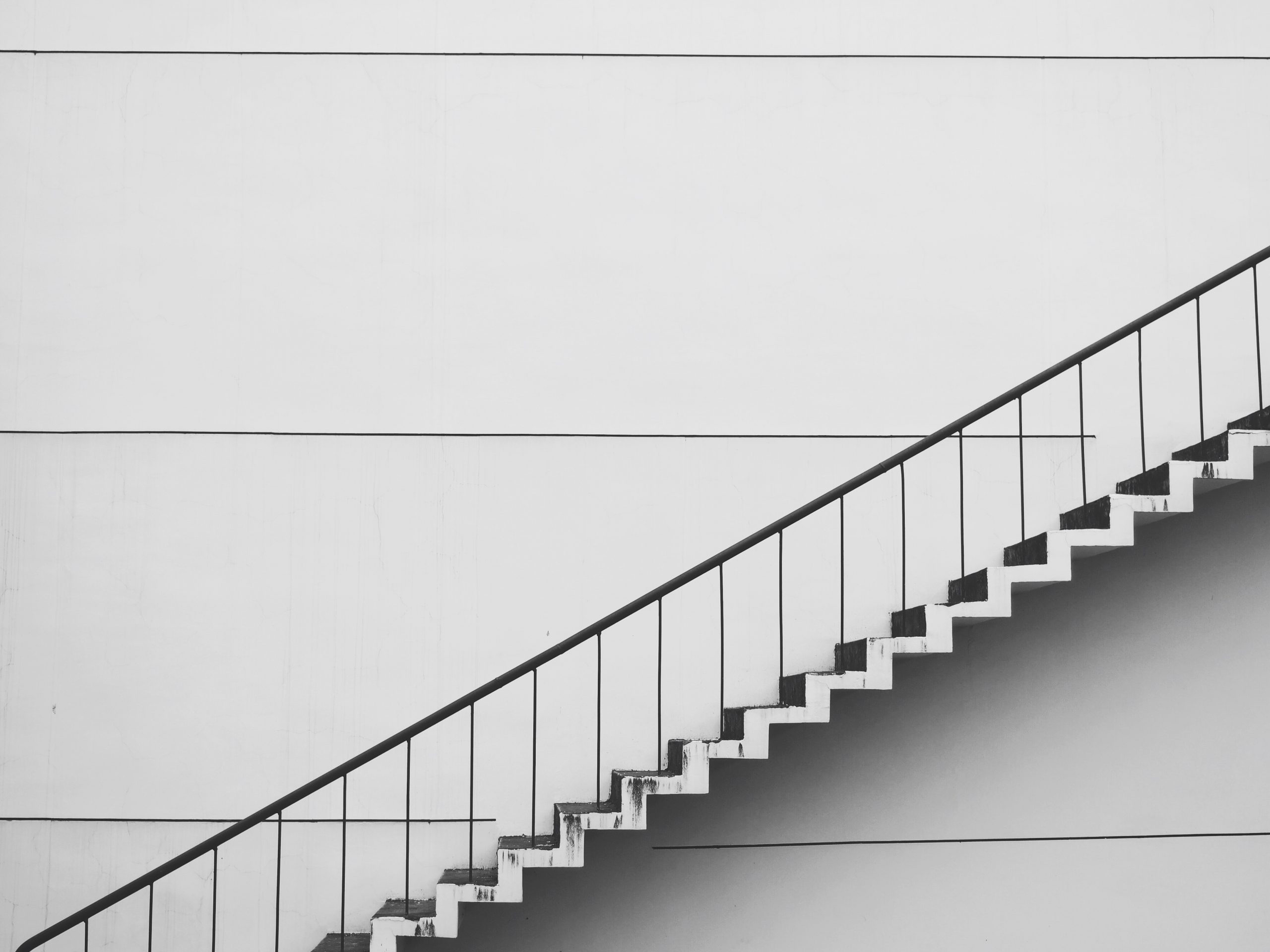 black and white photo of staircase