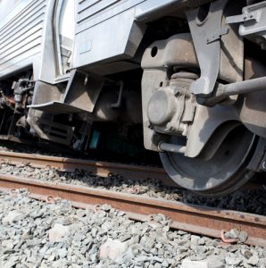 up close of train wheel after derailment