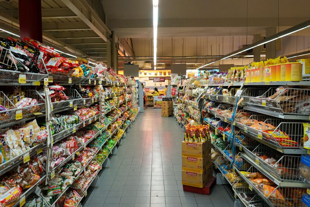 grocery store aisle with food in supermarket
