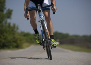 close up of cyclist cycling on bicycle