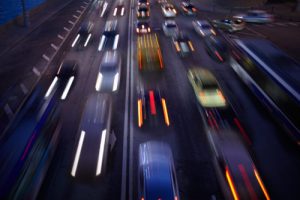 blurred motion photo of driving on highway at night