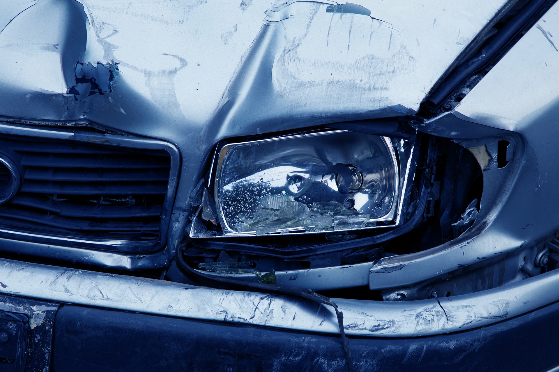close up of car damage after auto accident