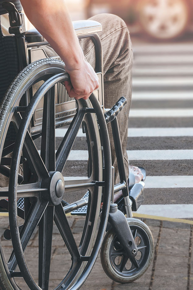 close up of man in wheelchair after serious injury accident