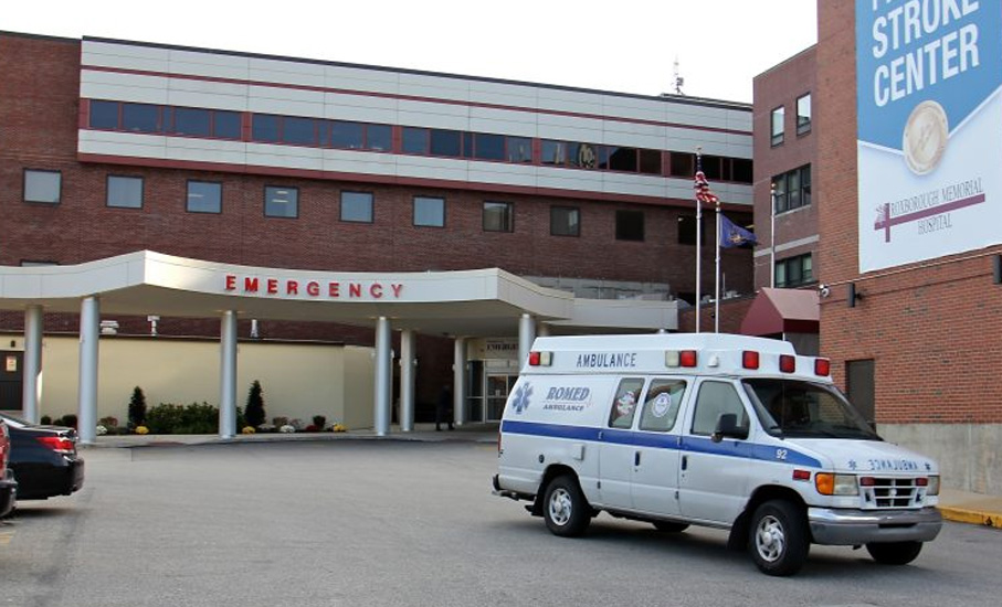 ambulance outside of ER entrance at hospital