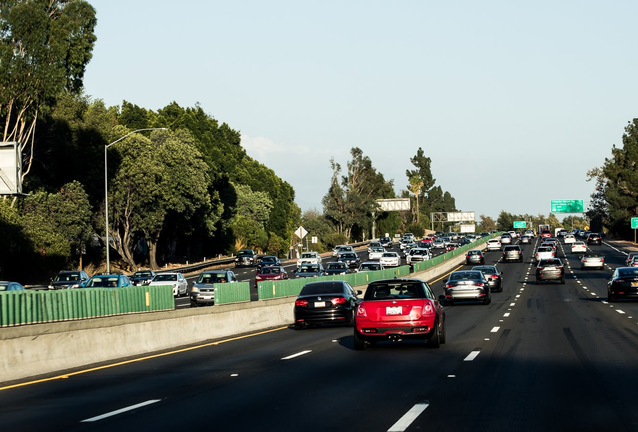 cars driving along a multi-lane highway