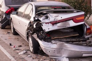 crashed silver saturn vehicle