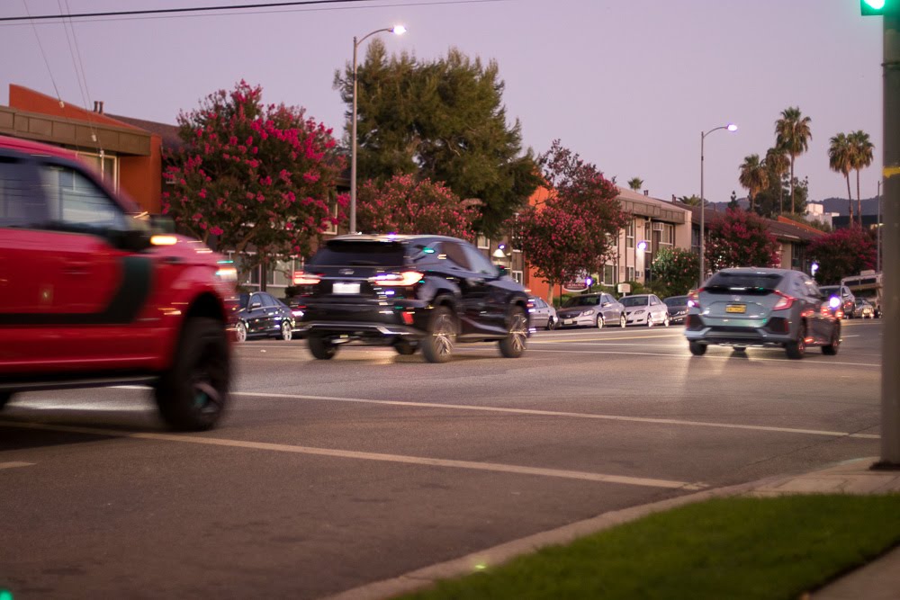 cars driving in suburban area