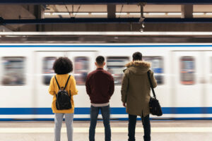 group-of-people-waiting-to-get-on-public-transportation