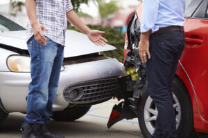 two-men-facing-each-other-after-a-car-accident