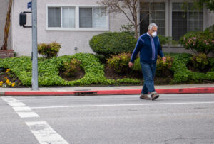 man cross the road