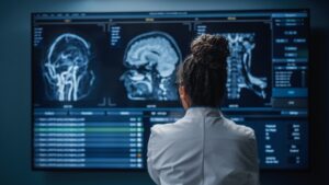 female doctor reviewing brain scans