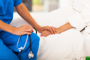 doctor comforting patient in the hospital