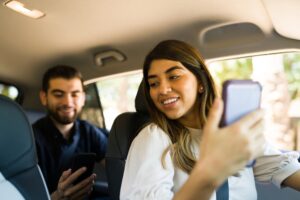 female rideshare driver talking to passenger