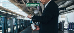 man watching subway train roll in