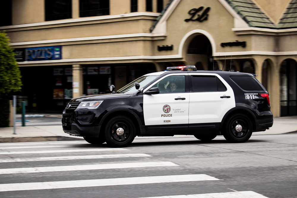 Vehicle Reverses, Hits Officer Near 19th St