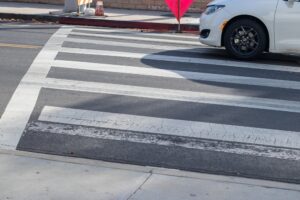 Driver Backs Into Pedestrian on Addison Way
